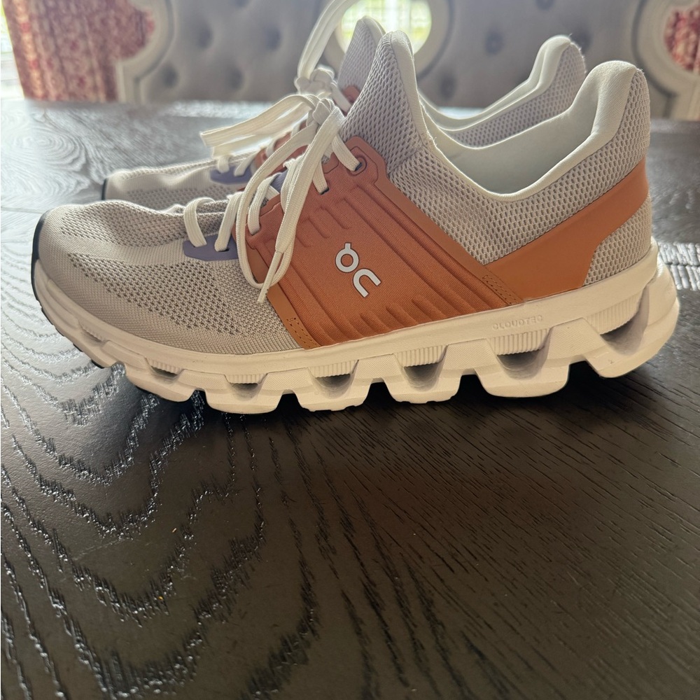 On Running Gray and Orange Sneakers